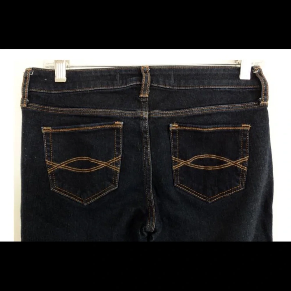 2 pairs Abercrombie & Fitch size 10 dark rinse flare jeans. 1 pair is NEW. - Picture 3 of 5